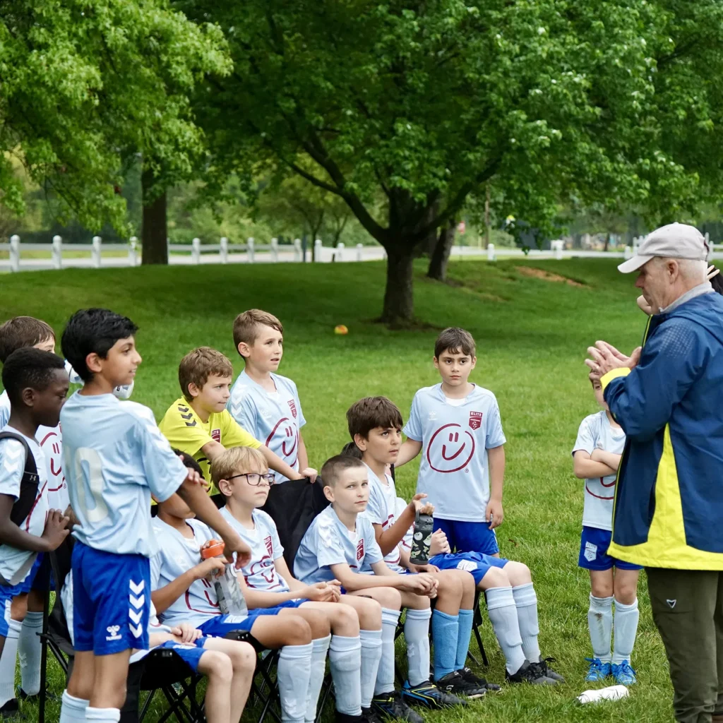Steve Locker addresses Locker Elite soccer players during a team session at Locker Soccer Academy in Columbus, Ohio.